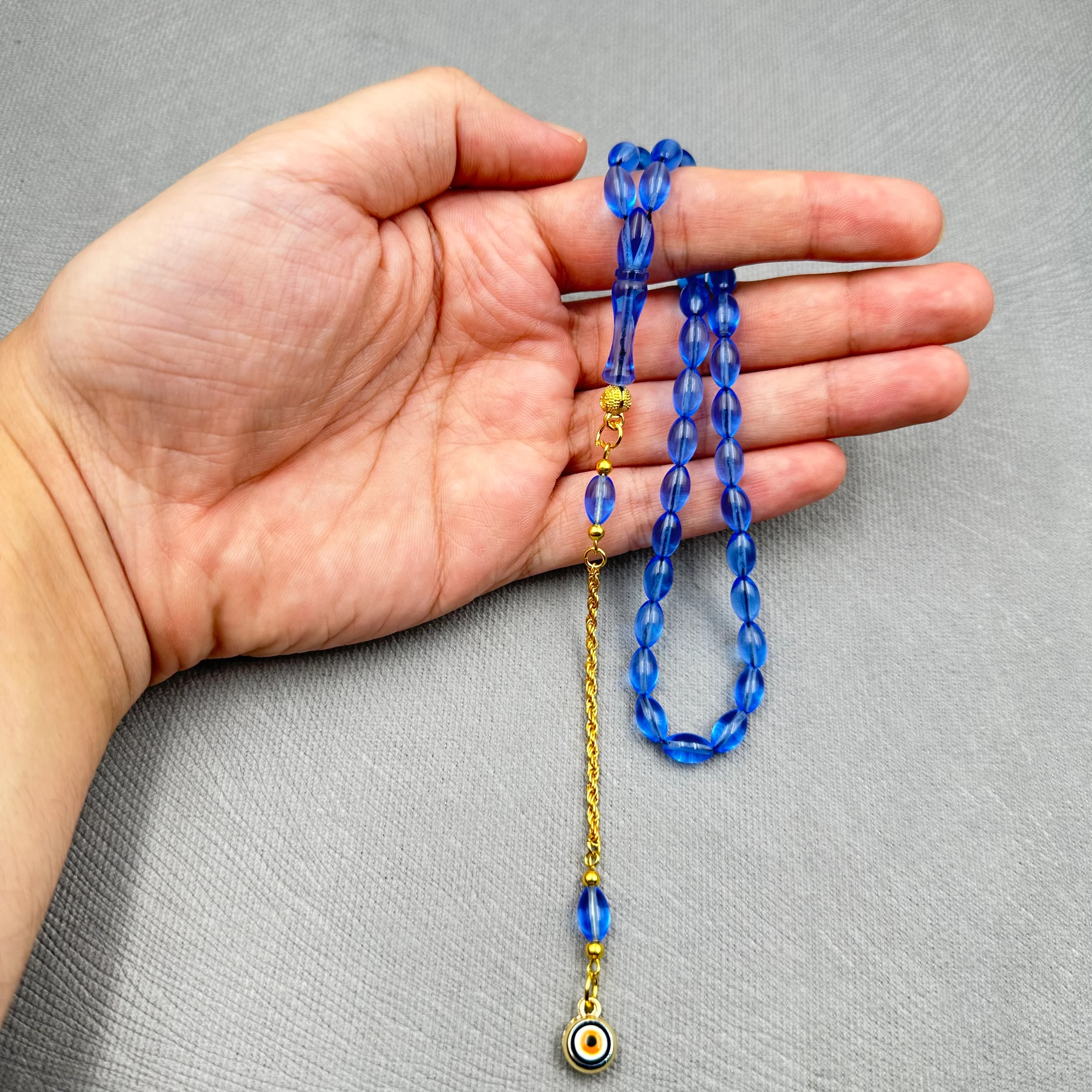 Pirinç Püsküllü Nazar Boncuğu Detaylı Bilek Boy Mavi Uçak Camı Tespih